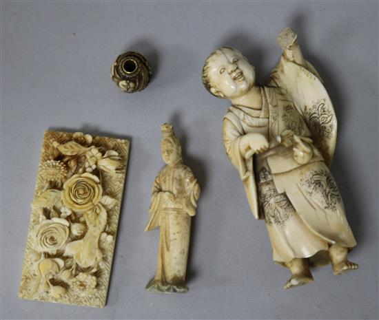 A Japanese ivory figure an ojime, a Chinese ivory figure and a plaque